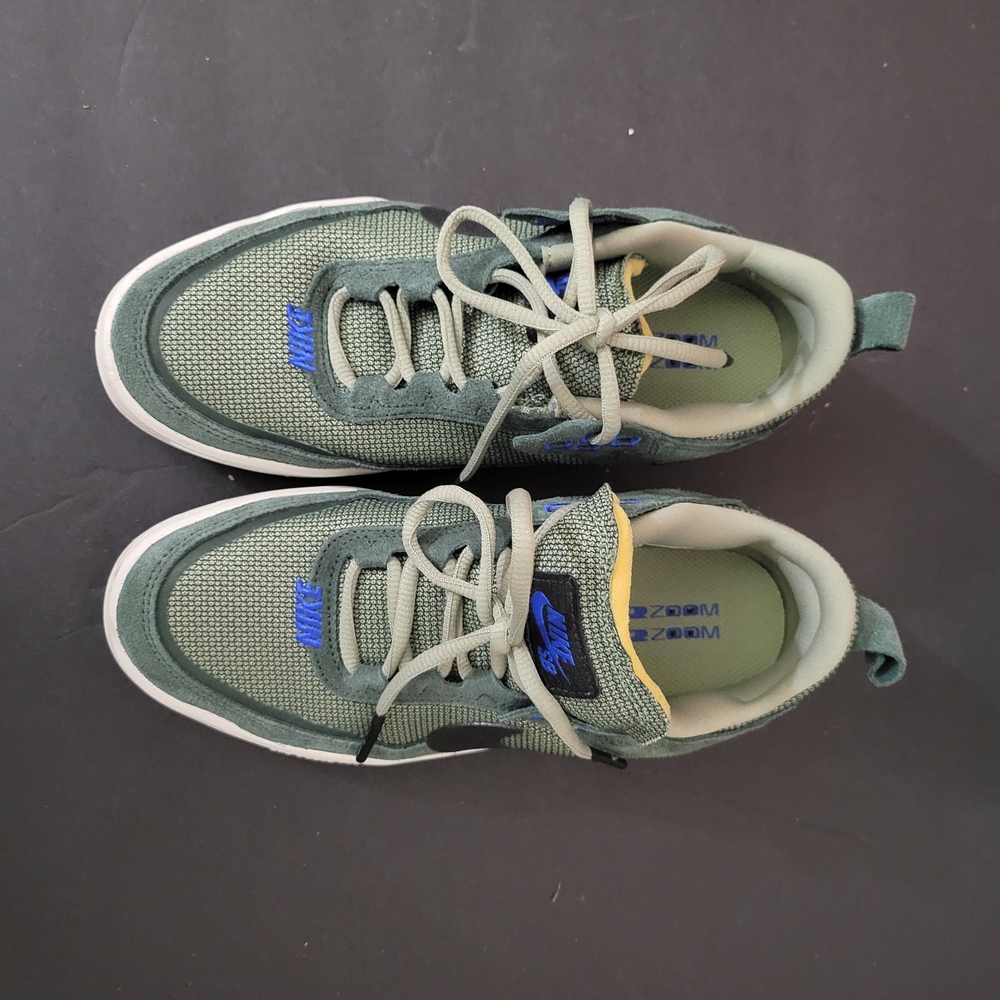 Nike Sneakers with Blue Accents